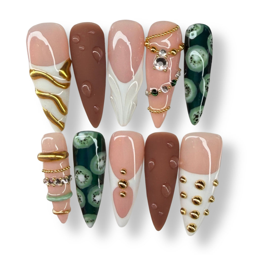 Set of decorative nails with various designs on a white background